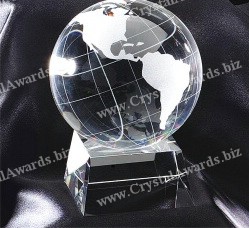 Optical crystal globe with a trapezoidal glass conical base. We can design custom engraving on the base or within the trapezoidal base. 